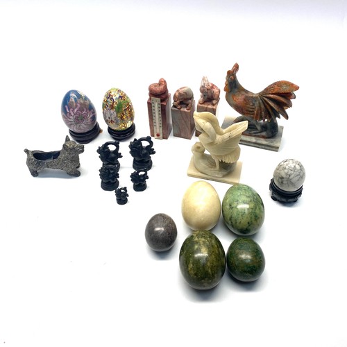 696 - Vintage Chinese cloisonné egg and a mixed selection of polished stone eggs, Asian ink stamps.