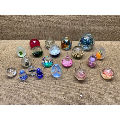 453 - Large selection of paper weights.