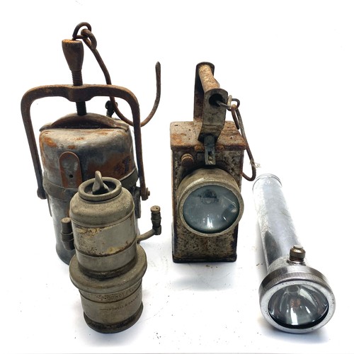 722 - 4 different lamps including: The Premier lamp engineering Co, Powell & Hanmar and Concordia dry batt... 