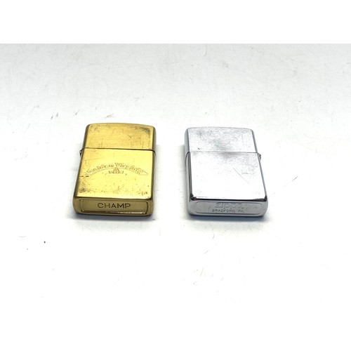 724 - Zippo Bradford PA USA and golden Virginia lighters.