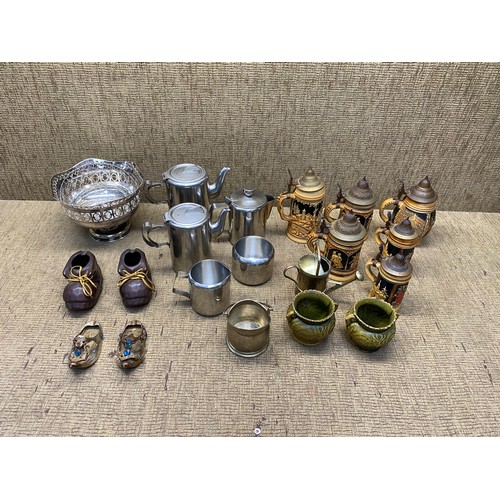 467 - Mixed items including coffee set, 6 stein jugs, and 2 brass slippers.