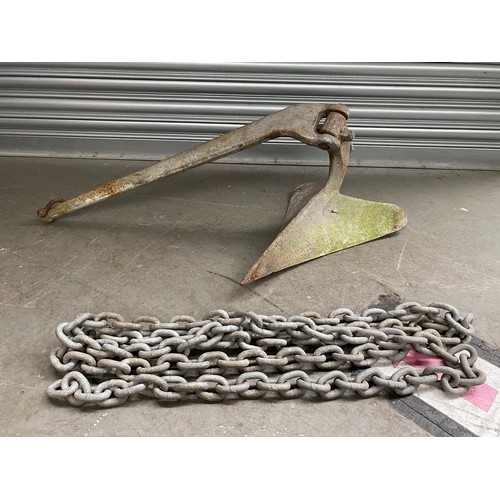 1164 - Heavy iron drag anchor with drop chain.