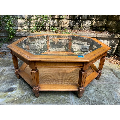 1170 - octagonal glass coffee table.