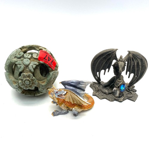 747 - Two myth and magic figures including keeper of the magic and a soapstone puzzle ball style ornament