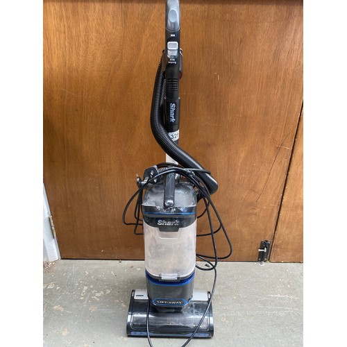 329 - Shark lift-away vacuum cleaner.