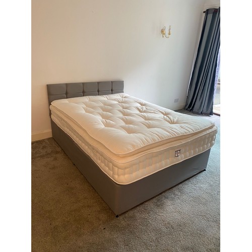 320 - double bed with mattress and head board.