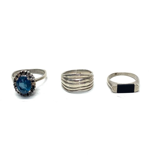 761 - Three silver rings, one with a large aquamarine stone and old cut Cushing diamond surround, missing ... 