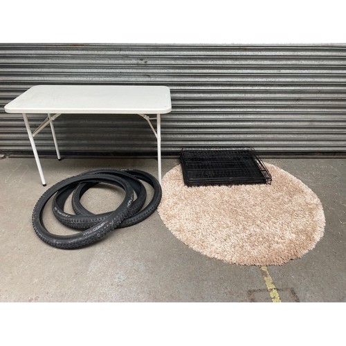 14 - 4ft plastic fold-out table, large dog cage and three mountain bike tyres including an XR5-TEAM ISSUE... 