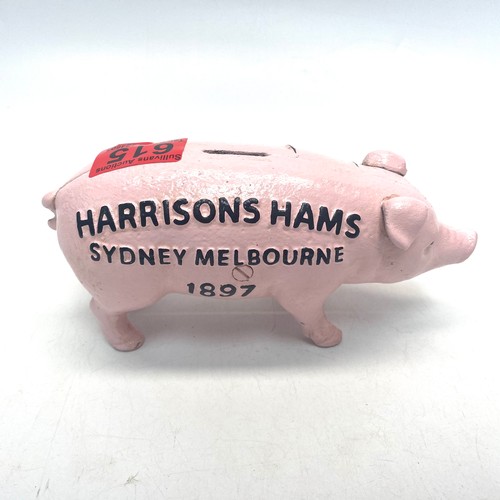 615 - Pink cast iron pig money box.