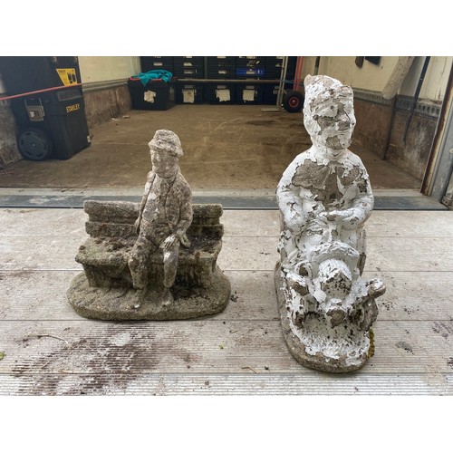 31 - Two large concrete garden figures.