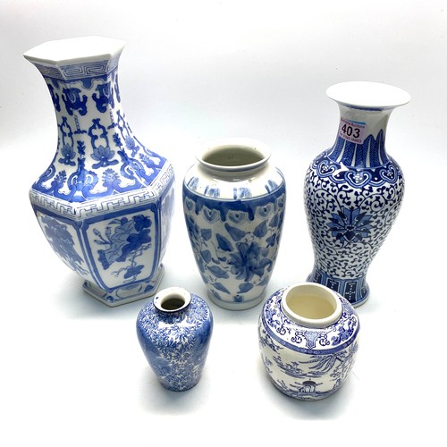 403 - Five vases including Chinese tallest 40cm.