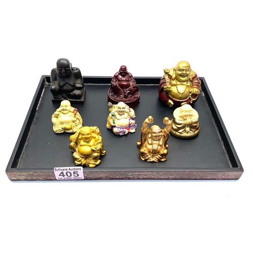 405 - 8 small buddhas on a tray.