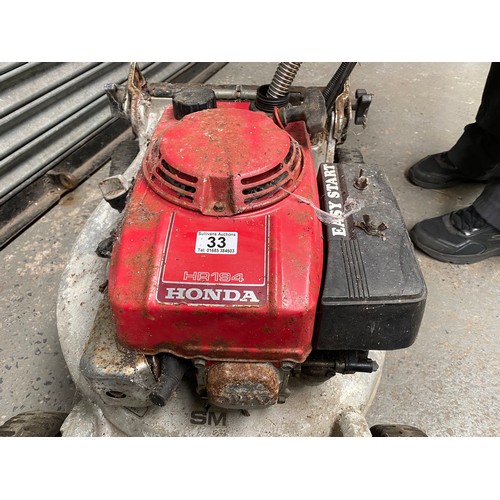 33 - Honda HR194 easy start petrol and electric start, lawn mower. Starts and runs.