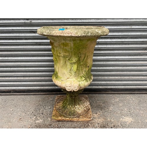 1013 - Composite stone garden urn on plinth 92x64cm.