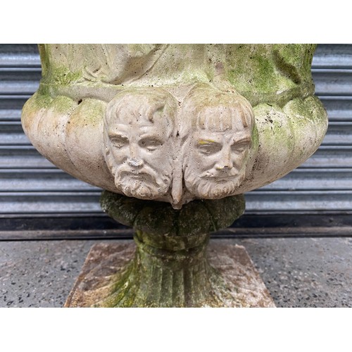 1013 - Composite stone garden urn on plinth 92x64cm.