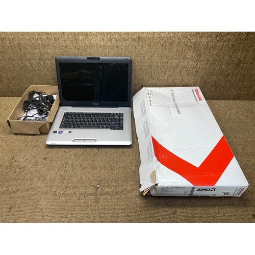 56 - toshiba portable computer SN: X9867471K.