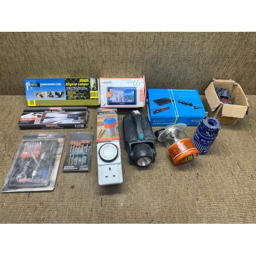 62 - selection of tools and car accessories including digital caliper, digital angle grinder, garmin sat ... 