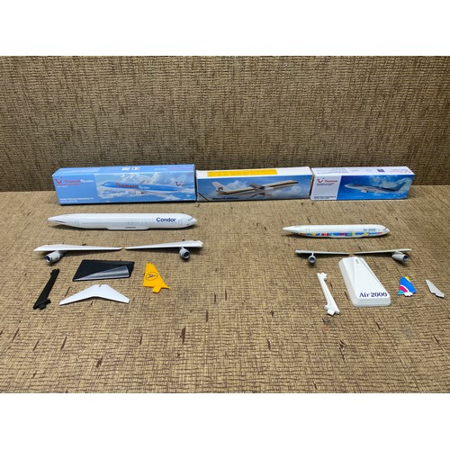 421 - collectable scale model airplanes including thomas, monarch airlines, and a condor.