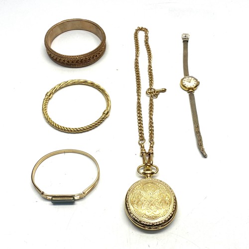 655 - 3 yellow metal bangles, pocket watch and a wrist watch.