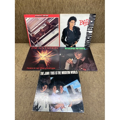 1033 - collection of vinyl LP records including the beatles, michael jackson, and the jam.