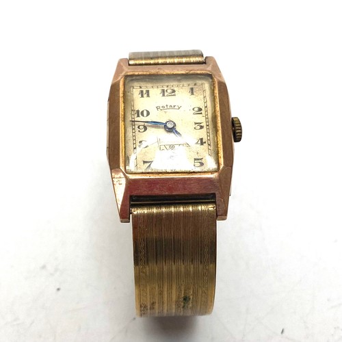 820 - 9ct rose gold rotary watch with rolled gold strap. (not running)