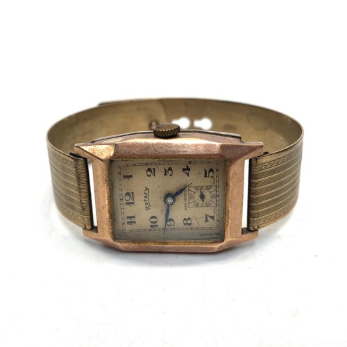 820 - 9ct rose gold rotary watch with rolled gold strap. (not running)