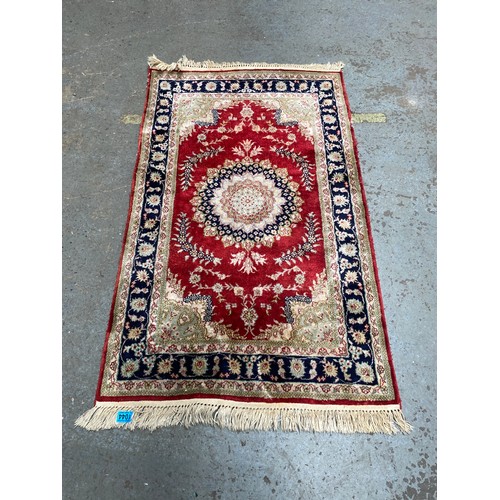 1044 - hand knotted pure silk carpet 136 x 78cm.