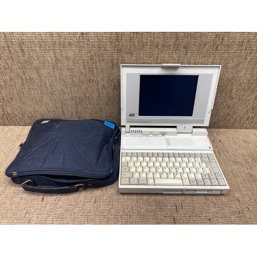 1045 - AST premium exec 386SX/25 laptop.