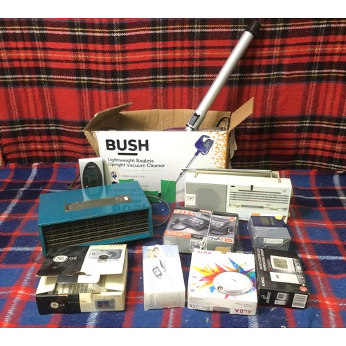 169 - Mixed electricals including Hoover blower heater, Bush vacuum and a digital camera