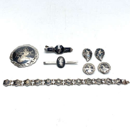 835 - Vintage sterling silver Siam Niello the dancing goddess items including a large brooch/pendant, two ... 