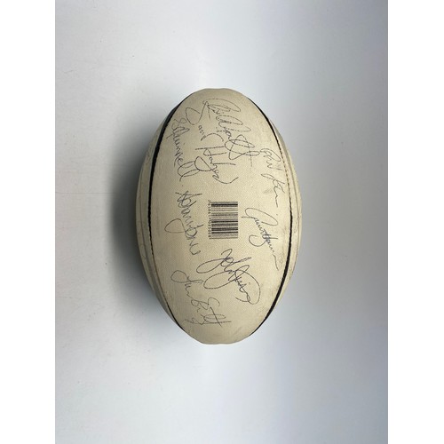 489 - Patrick challenger II rugby ball signed by Llanelli Team including: Scott Quinell and Gavin Thomas.