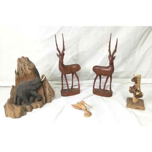 750 - A selection of treen items including a pair of antelope, an elephant and a humming bird