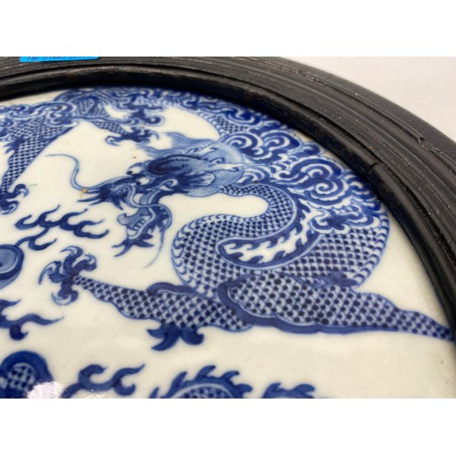 1092 - Antique Chinese blue and white four-clawed dragon porcelain circular plaque, for table screening wit... 