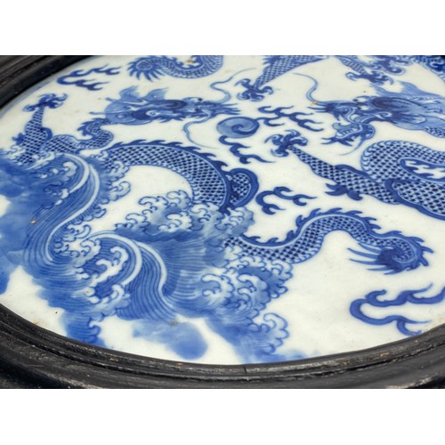 1092 - Antique Chinese blue and white four-clawed dragon porcelain circular plaque, for table screening wit... 