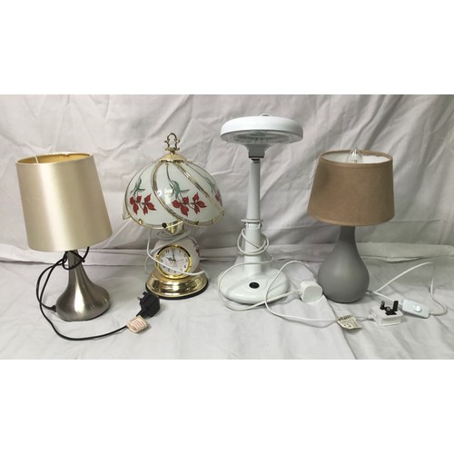 258 - Four lamps including a clock touch lamp and a magnifying light