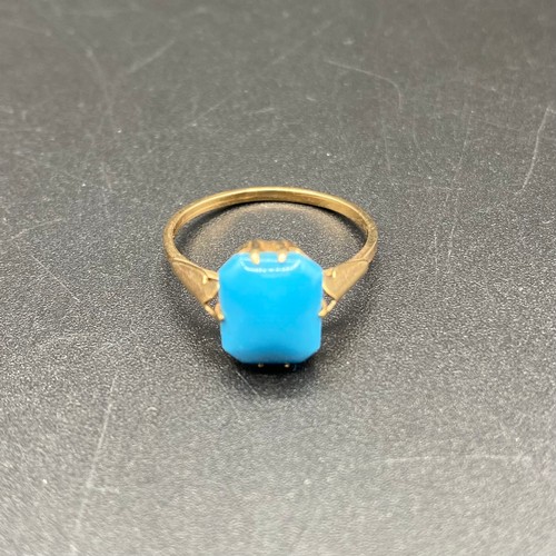 866 - 9ct gold ring with an oblong Turquoise stone. Size P and 1.8g.