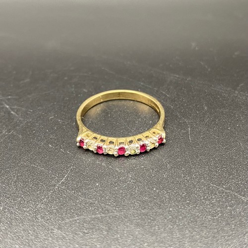 867 - 9ct gold ring with rubies and CZ. Size N. 1.7g.