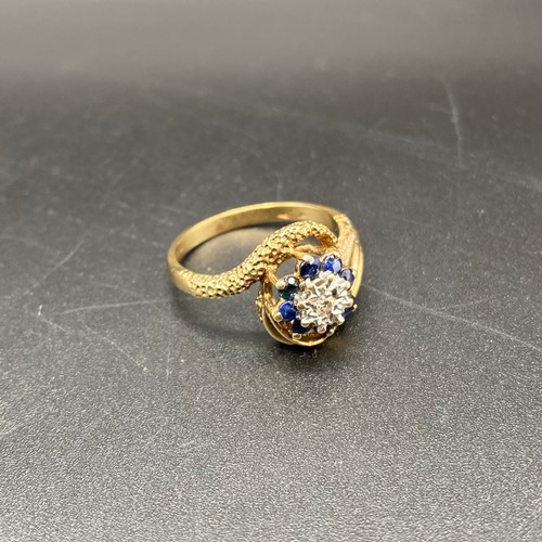 868 - 9ct gold, diamond and green sapphire flower ring. 4g and size R.