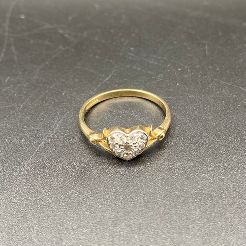 878 - 9ct gold and CZ heart-shaped ring. Size P and 1.9g.