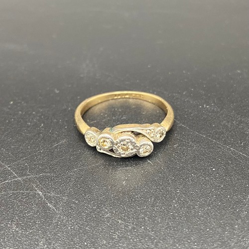 882 - 9ct gold ring with five diamonds in a platinum mount. Size J and 2g.