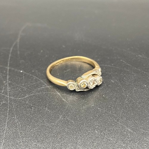 882 - 9ct gold ring with five diamonds in a platinum mount. Size J and 2g.