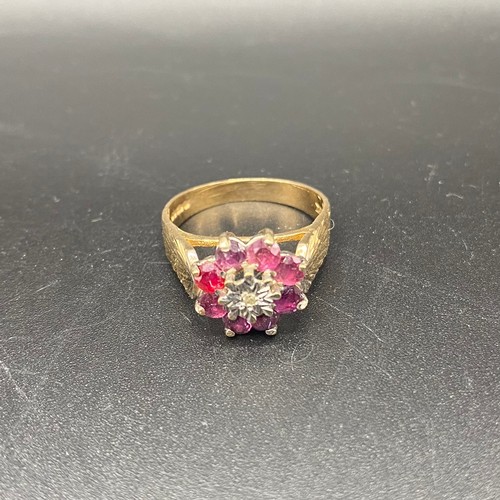 883 - 9ct gold cluster ring with diamonds and sapphires. Size P and 3.7g.