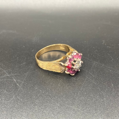 883 - 9ct gold cluster ring with diamonds and sapphires. Size P and 3.7g.