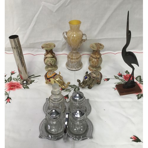 275 - A selection of items including jewelled elephants, posy vase and a condiment set