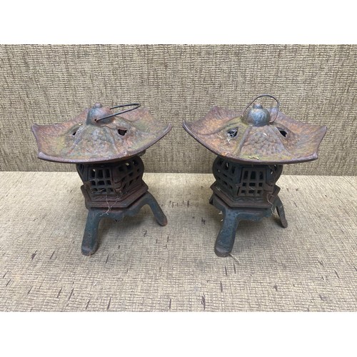 1119 - Pair of Japanese cast iron ornamental lantern.