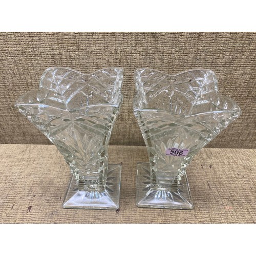 506 - 2 glass vases; 26cm tall.