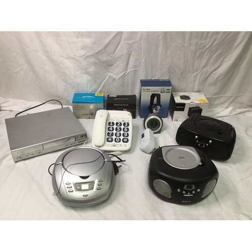 293 - Mixed electrical items including CD players, headphones and alarm clocks