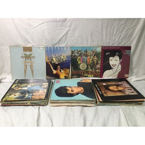 309 - Vinyl records/LP’s including Madonna, Duran Duran and The Beatles