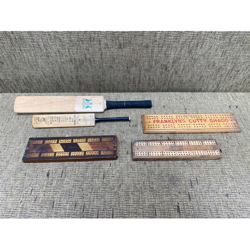 514 - 2 miniature cricket bats including Gunn & Moore autographed by West indies and the nottinghamshire 3... 