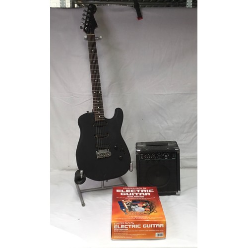 323 - Electric guitar starter pack dvd edition, fx-15 speaker, and a electric guitar.